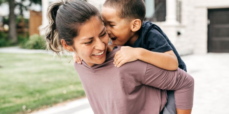 mom giving son piggy back ride emotional courage all feelings welcome